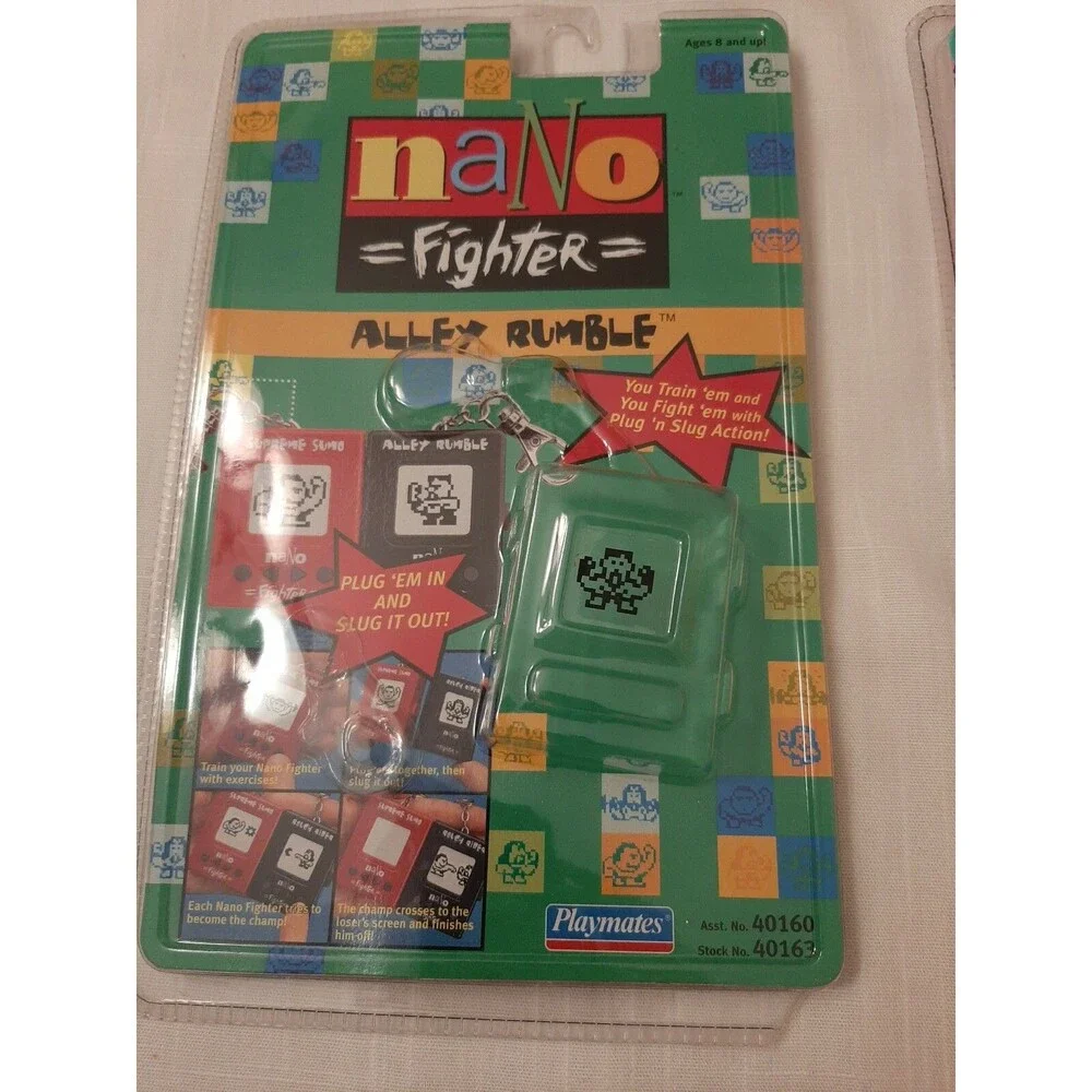 (4 EMPTY PACKAGES)1997 NANO FIGHTER SUPREME SUMO PLAYMATES MICRO PETS NANO KITTY